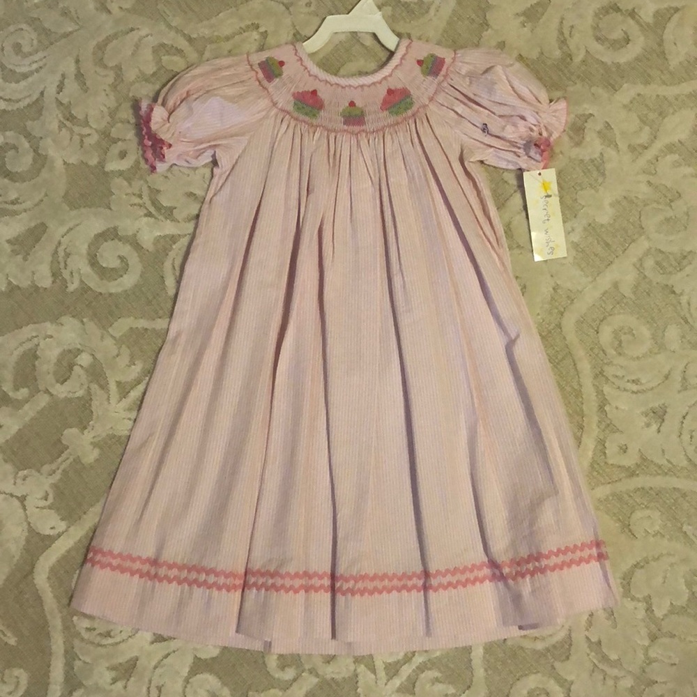 Size 4T Secret Wishes smocked cupcake dress.